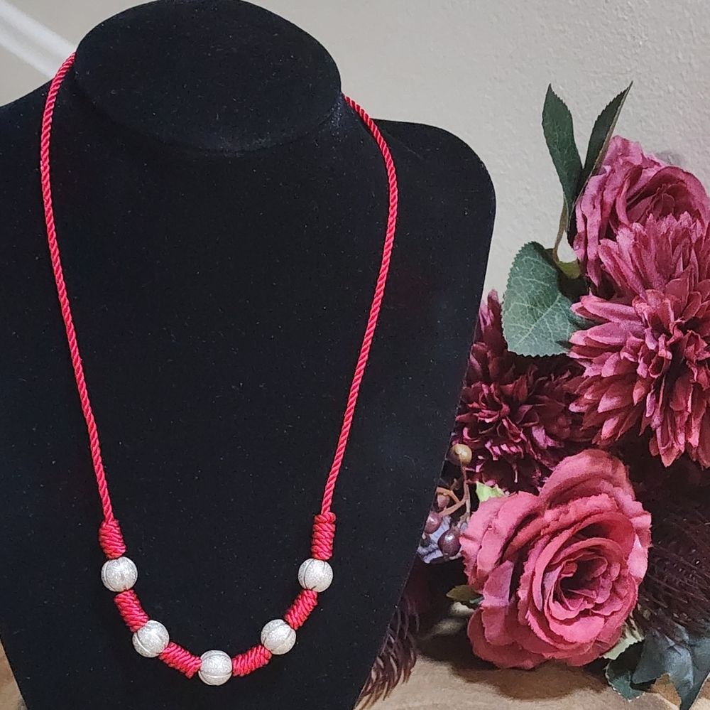 Red Knotted Cord Necklace With Textured Glittery Silver Beads